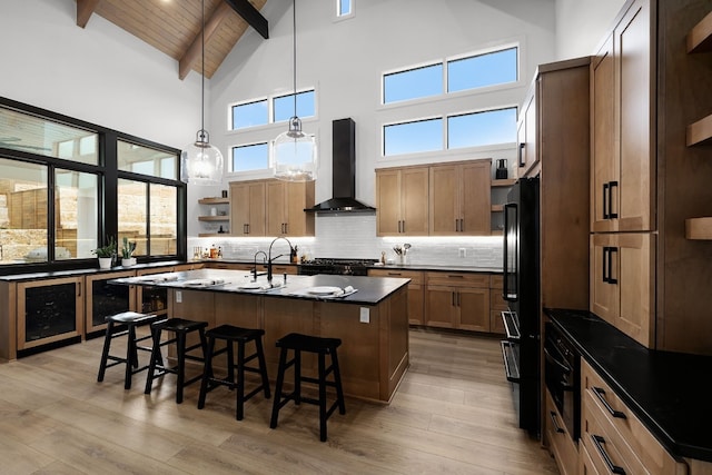 kitchen with open shelves, wooden ceiling, a kitchen breakfast bar, wall chimney exhaust hood, and tasteful backsplash