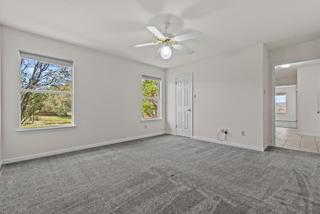 25048 River Rd, Spicewood, TX 78669 - spare room with carpet floors and ceiling fan