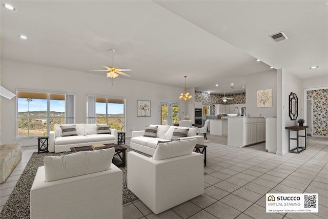 25048 River Rd, Spicewood, TX 78669 - living area featuring recessed lighting, a ceiling fan, light tile patterned floors, and a chandelier