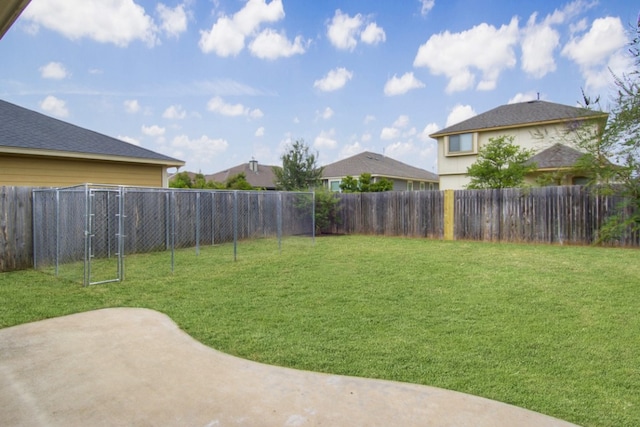 view of yard featuring a patio and a fenced backyard