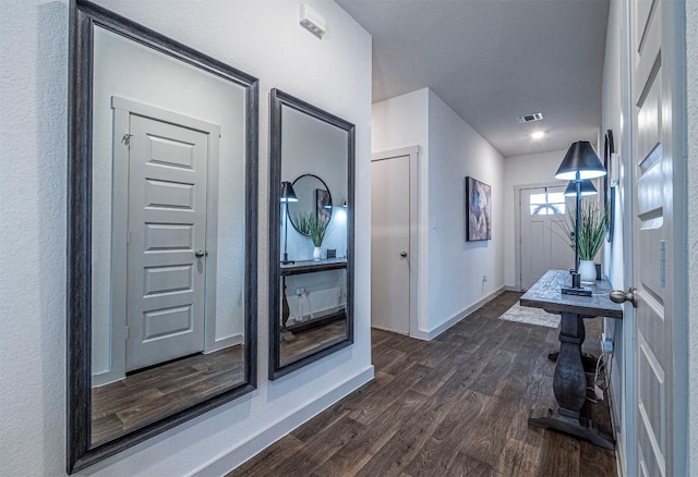 208 Greens Bayou Trl, Hutto, TX 78634 - entrance foyer featuring dark wood-style floors and baseboards