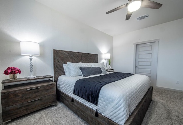 bedroom featuring visible vents, a ceiling fan, and carpet flooring