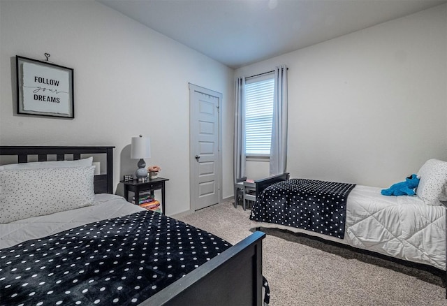 208 Greens Bayou Trl, Hutto, TX 78634 - bedroom featuring carpet floors and baseboards