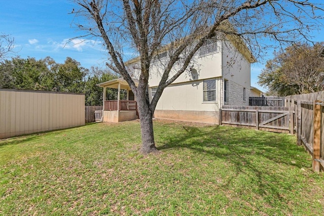 view of yard with a fenced backyard