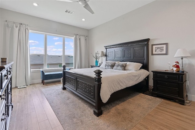 bedroom with light wood-type flooring, visible vents, recessed lighting, baseboards, and ceiling fan