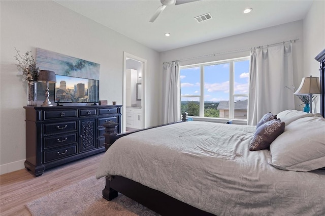 bedroom featuring light wood finished floors, visible vents, ceiling fan, baseboards, and recessed lighting