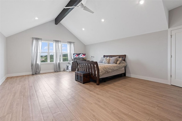 bedroom featuring baseboards, ceiling fan, vaulted ceiling with beams, and light wood-style floors