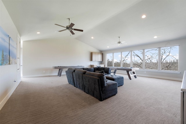 living room featuring a ceiling fan, baseboards, lofted ceiling, recessed lighting, and light carpet