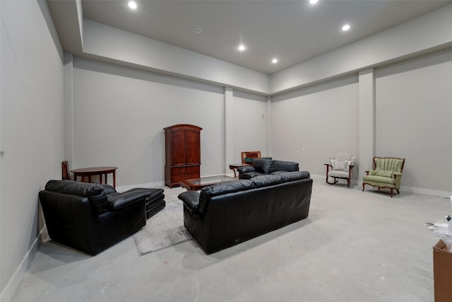 living room featuring recessed lighting and baseboards