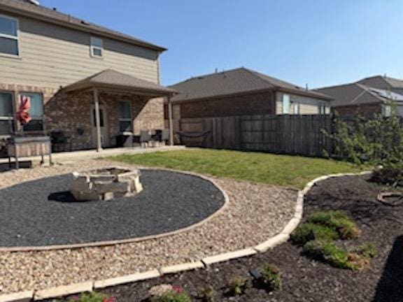 view of yard featuring a patio area and fence