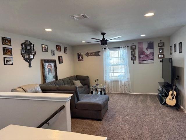 living area featuring a ceiling fan, visible vents, baseboards, recessed lighting, and carpet flooring