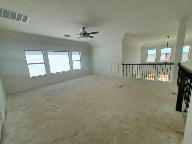 empty room with visible vents and a ceiling fan