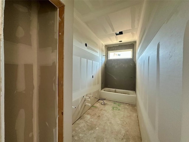 bathroom with walk in shower and a washtub