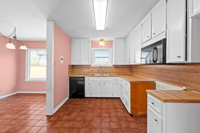 kitchen featuring black appliances, decorative backsplash, a textured ceiling, white cabinetry, and a sink