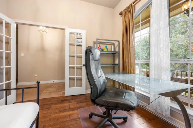 10033 Longhorn Skwy, Dripping Springs, TX 78620 - office featuring hardwood / wood-style flooring, plenty of natural light, french doors, and a chandelier