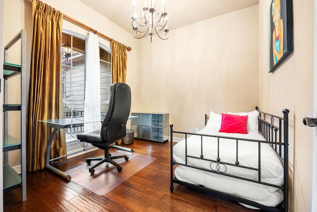 10033 Longhorn Skwy, Dripping Springs, TX 78620 - office featuring a chandelier and hardwood / wood-style flooring