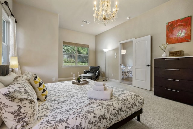 10033 Longhorn Skwy, Dripping Springs, TX 78620 - bedroom featuring a chandelier, light carpet, and baseboards