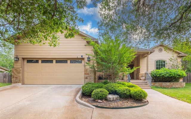 10033 Longhorn Skwy, Dripping Springs, TX 78620 - view of front of house featuring stone siding and driveway