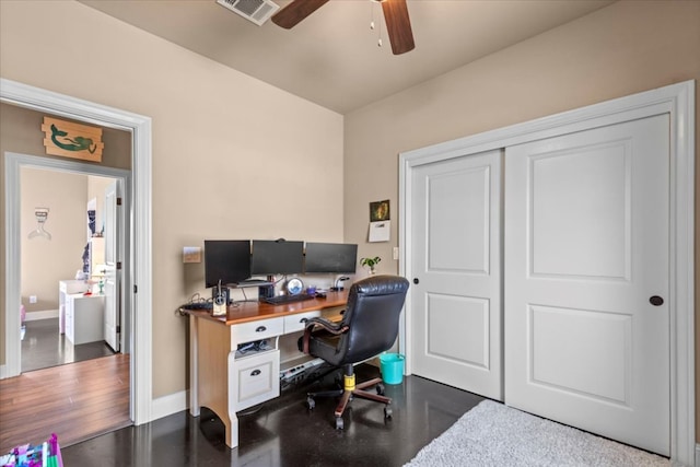 office area with baseboards, wood finished floors, visible vents, and ceiling fan