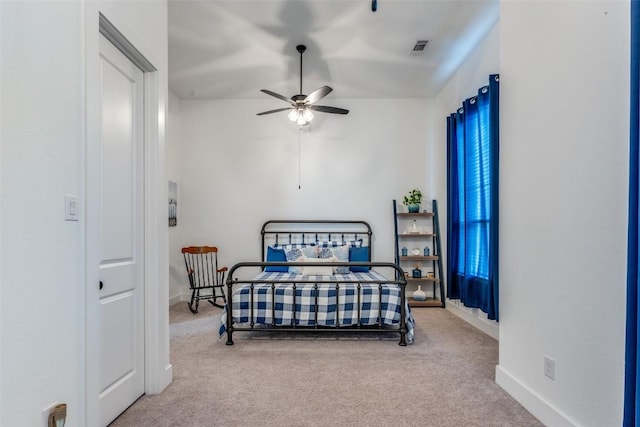 22306 Cape Travis Bnd, Lago Vista, TX 78645 - carpeted bedroom with a ceiling fan, visible vents, and baseboards