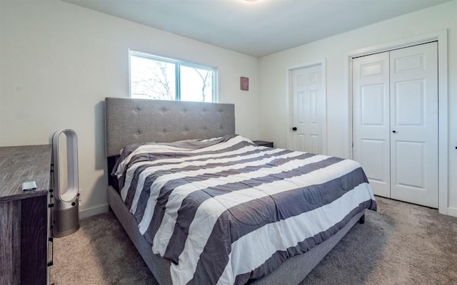 bedroom featuring carpet flooring and baseboards