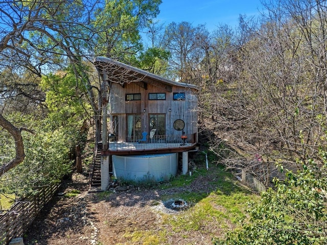 rear view of house with stairs