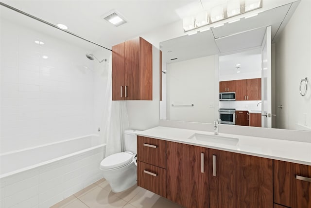 full bath featuring tile patterned floors, visible vents, shower / bath combo with shower curtain, toilet, and vanity