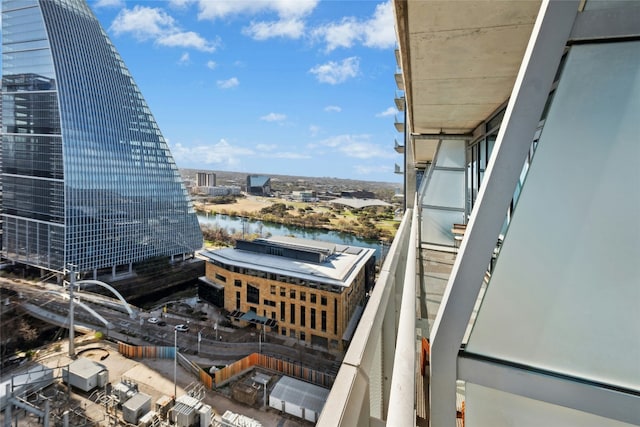 property's view of city featuring a water view