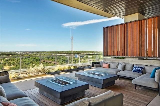 222 W Ave Unit 2109, Austin, TX 78701 - deck featuring an outdoor living space with a fire pit