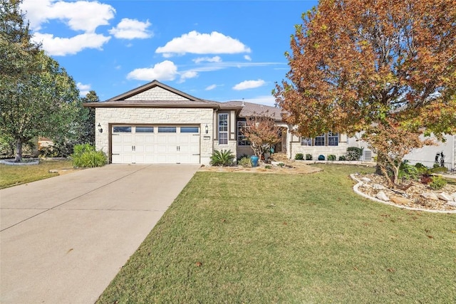 ranch-style home with a front lawn, stone siding, a garage, and driveway