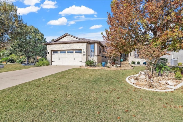 view of front facade with stone siding, cooling unit, concrete driveway, an attached garage, and a front yard