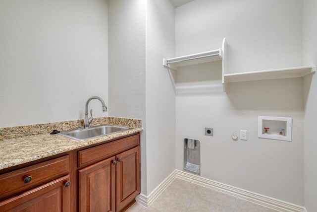 214 Apache Mountain Ln, Georgetown, TX 78633 - laundry room with washer hookup, hookup for an electric dryer, hookup for a gas dryer, cabinet space, and a sink