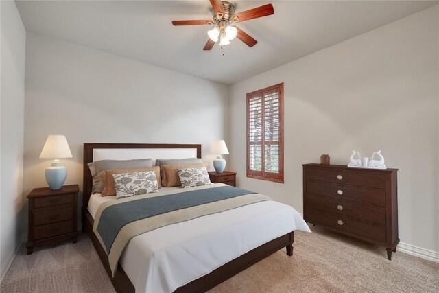 214 Apache Mountain Ln, Georgetown, TX 78633 - bedroom with baseboards, light carpet, and ceiling fan