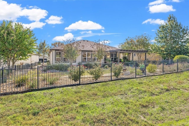 214 Apache Mountain Ln, Georgetown, TX 78633 - rear view of house featuring a yard, a pergola, fence, and stucco siding