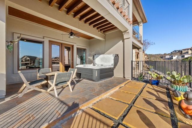 view of patio with ceiling fan