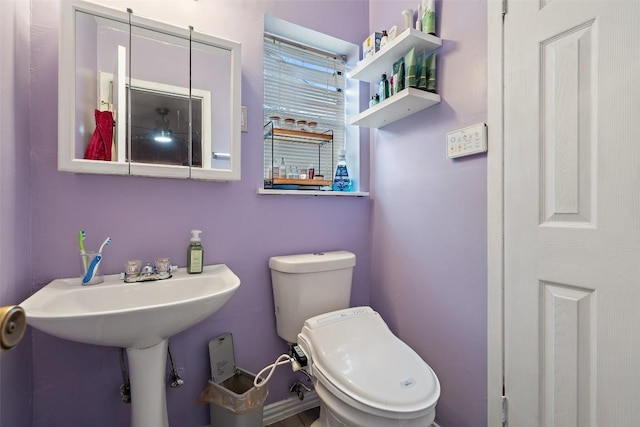 10505 Ruidosa St, Austin, TX 78719 - half bathroom featuring toilet