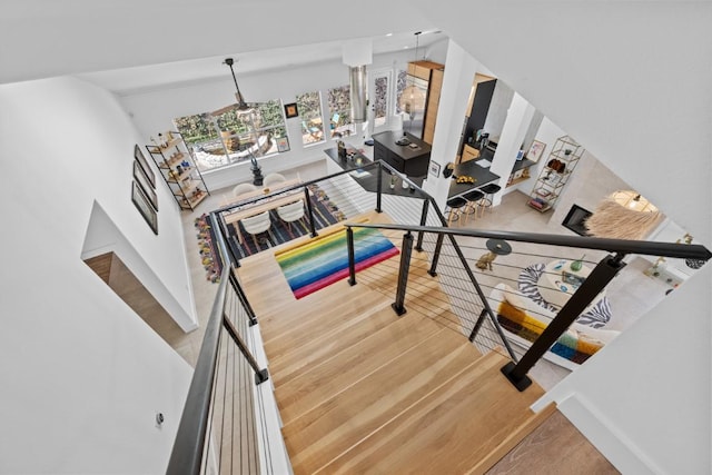 203 Golf Crest Ln, Lakeway, TX 78734 - stairs with wood finished floors and lofted ceiling