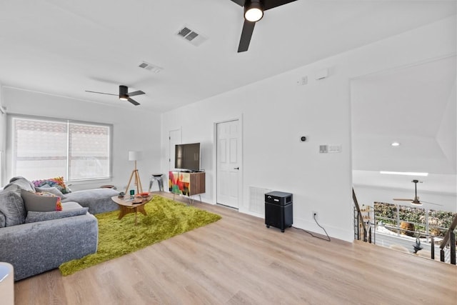 203 Golf Crest Ln, Lakeway, TX 78734 - living room featuring a ceiling fan and wood finished floors