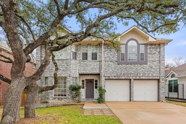 10914 Sierra Oaks, Austin, TX 78759 - view of front facade with driveway and an attached garage