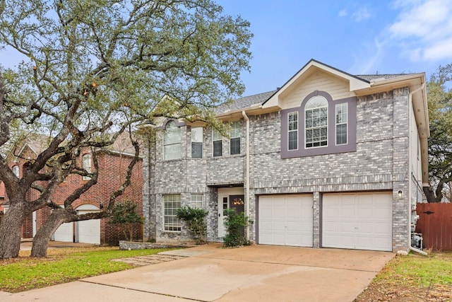 10914 Sierra Oaks, Austin, TX 78759 - view of front of house featuring concrete driveway and a garage