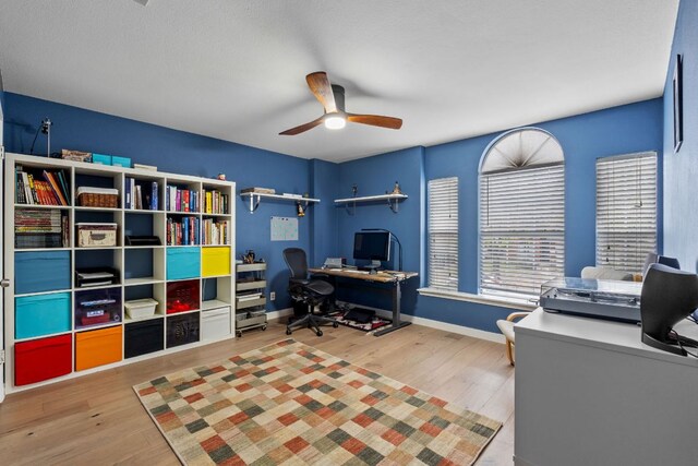 10914 Sierra Oaks, Austin, TX 78759 - home office with wood finished floors, ceiling fan, and baseboards