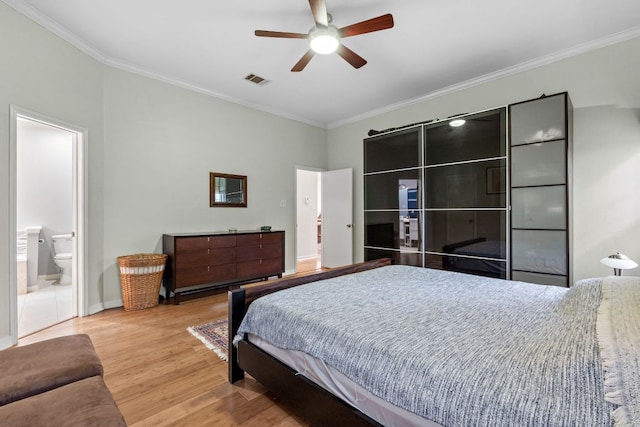 10914 Sierra Oaks, Austin, TX 78759 - bedroom featuring ornamental molding, light wood-type flooring, baseboards, ensuite bath, and a ceiling fan