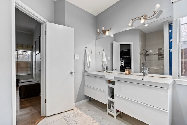 10914 Sierra Oaks, Austin, TX 78759 - full bath with vanity, a shower, and tile patterned flooring