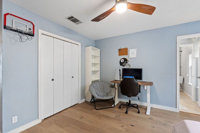 10914 Sierra Oaks, Austin, TX 78759 - office space with wood finished floors, a ceiling fan, and baseboards