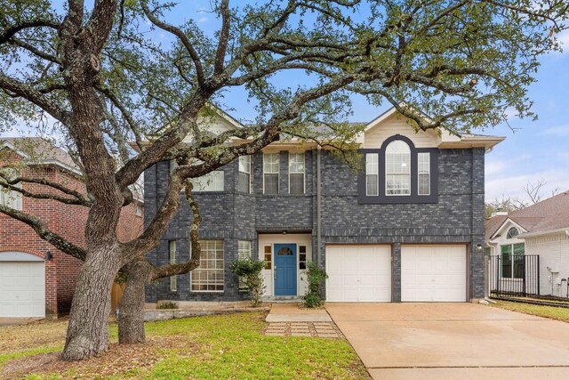 10914 Sierra Oaks, Austin, TX 78759 - traditional-style house featuring driveway and an attached garage