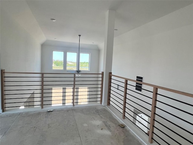 interior space with a ceiling fan and lofted ceiling