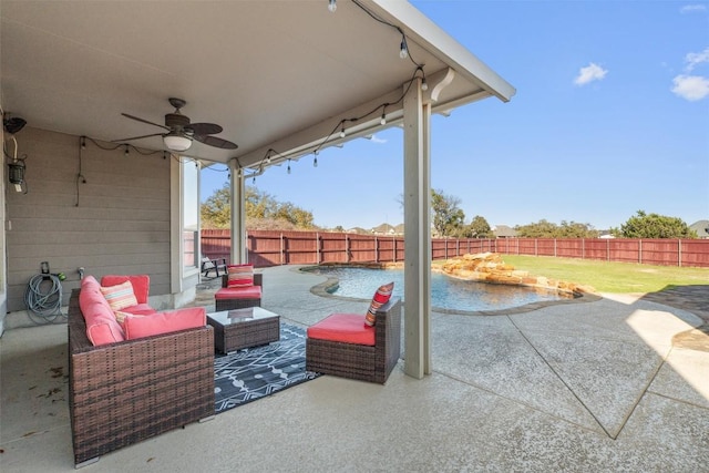 view of patio / terrace with a ceiling fan, a fenced backyard, and outdoor lounge area