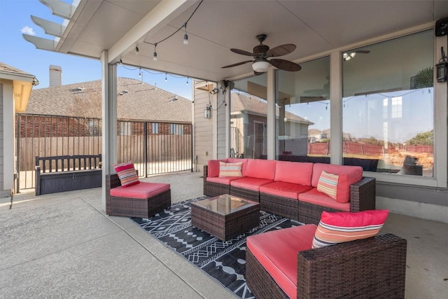 view of patio with a ceiling fan, fence, and an outdoor hangout area