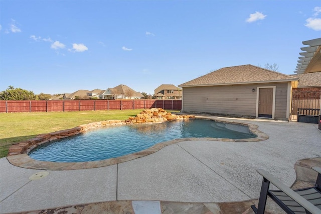 view of pool with a yard, a fenced in pool, a patio, and a fenced backyard