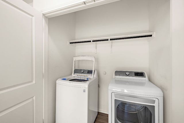 laundry room with laundry area and washer and clothes dryer